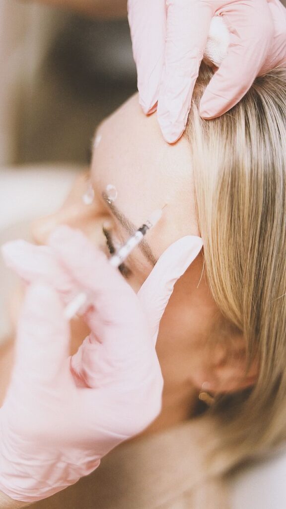 pexels photo 34220536 Close-up of a cosmetic injection procedure in a modern spa setting, enhancing beauty and wellness.